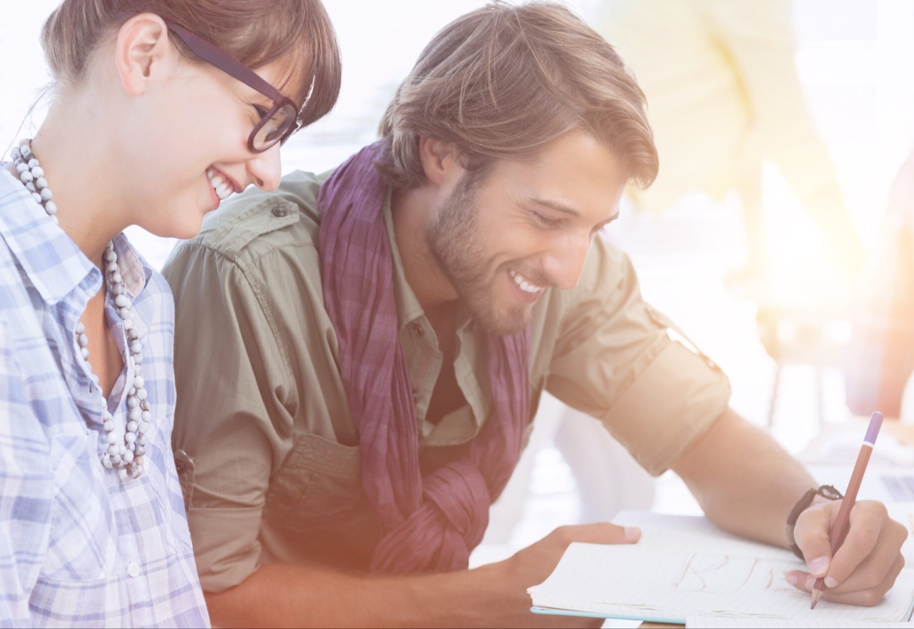 happy-designers-working-document-with-colleagues-working-scaled-1